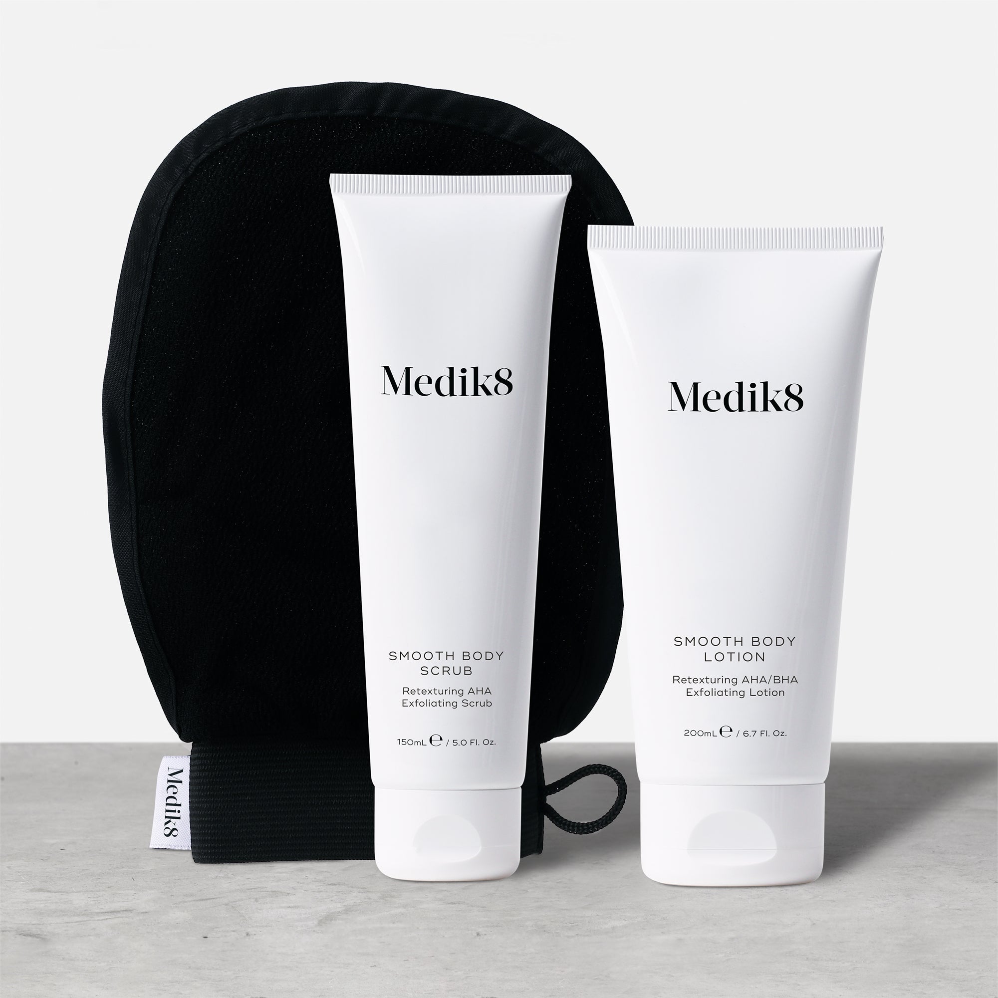 Smooth Body Exfoliating Kit™ by Medik8. A Retexturing AHA System For Bumpy & Dry Skin.